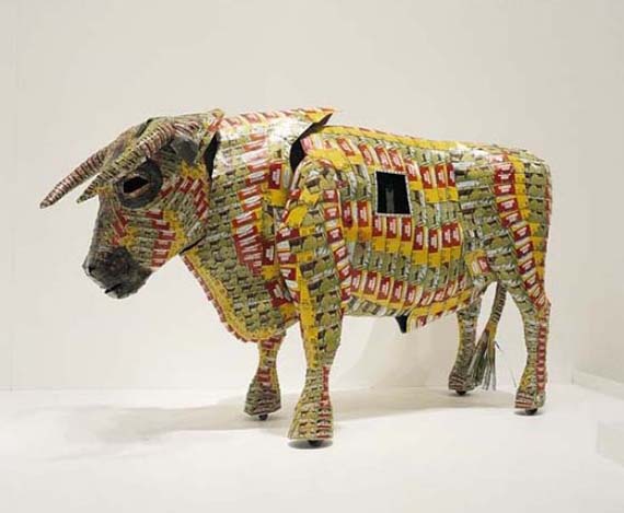 Michel Tuffery, New Zealand b.1966 | Povi tau vaga (The challenge) 1999 | Aluminium, pinewood, corn beef tins and rivets with Mini DV: 2:43 minutes, colour, stereo | Purchased 1999. Queensland Art Gallery Foundation | Collection: Queensland Art Gallery | © The artist